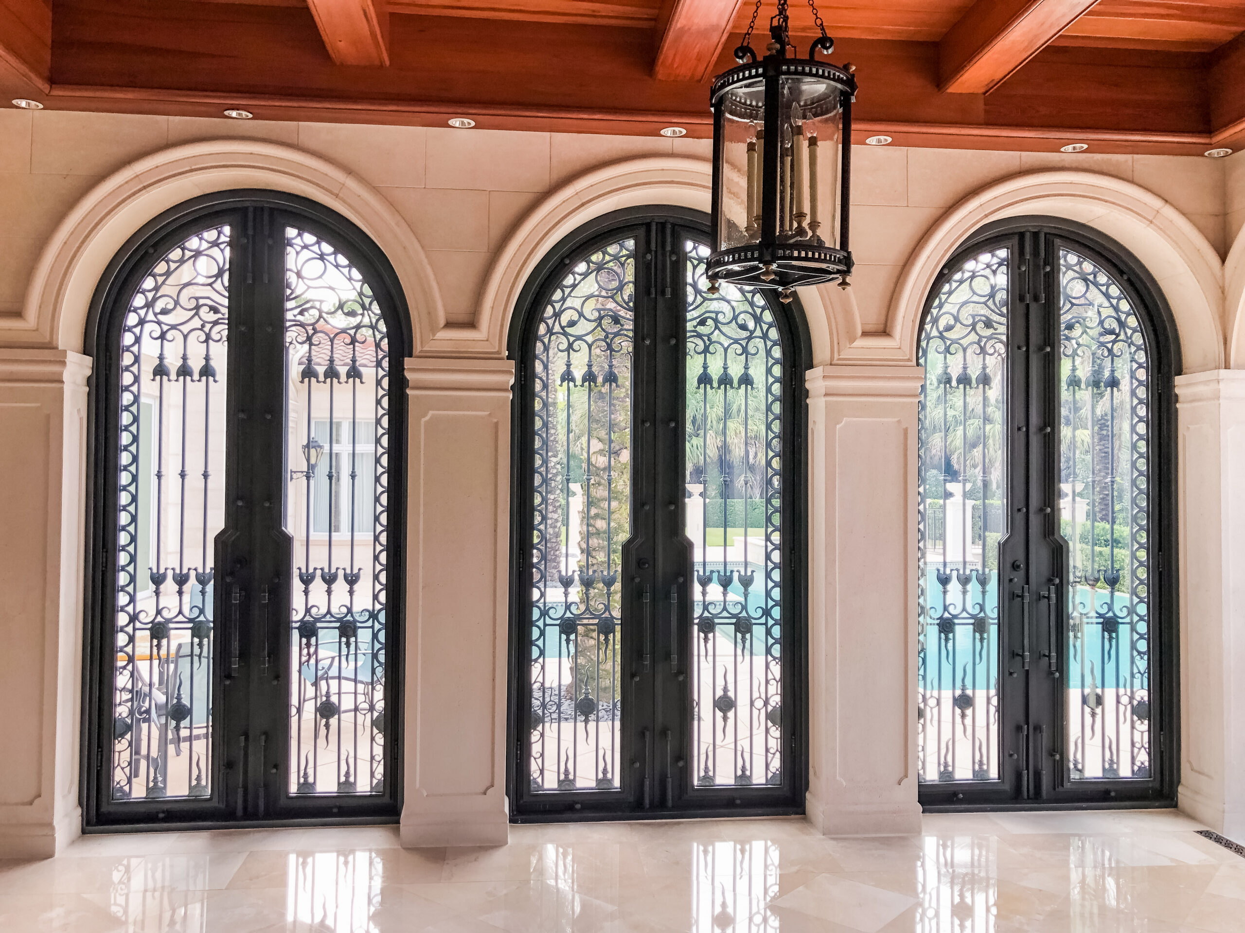 traditional iron arched top doors